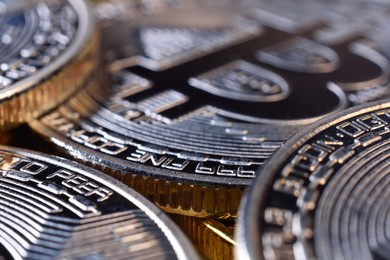silver coins with bitcoin symbol. cryptocurrency and payment concept. close up
