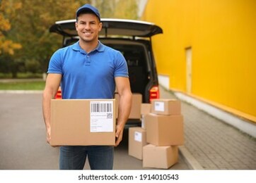 courier with parcel near delivery van outdoors. space for text
