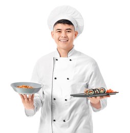 handsome asian chef with sushi rolls on white background