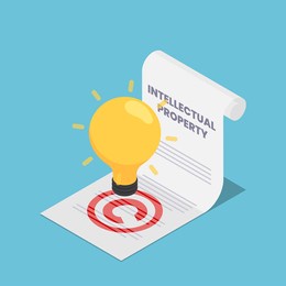 flat 3d isometric light bulb on intellectual property document. intellectual property and copyrights concept