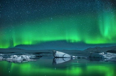 icebergs under the northern lights