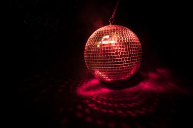 colorful disco mirror ball lights night club background. party lights disco ball. selective focus
