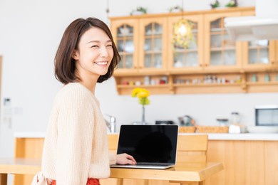 beautiful young asian woman using laptop