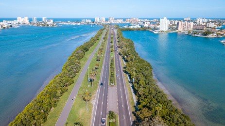beach road. aerial view on ocean or shore gulf of mexico. spring break or summer vacations in florida. hotels, restaurants and resorts. blue color water. clearwater beach fl. united states of america