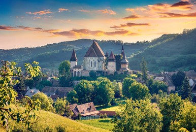 spectacular summer view of fortified church of biertan, unesco world heritage sites since 1993. gorgeous morning cityscape of biertan town, transylvania, romania, europe. 