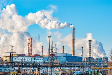 the pipes of the metallurgical plant, from which dirty smoke rises into the clear sky. air pollution! exhaust gases, depletion of the ozone layer,the greenhouse effect. an environmental disaster.