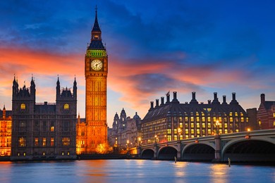 big ben and westminster bridge at dusk in london