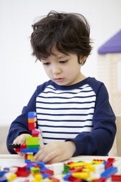 the image of cute asian kid with lego