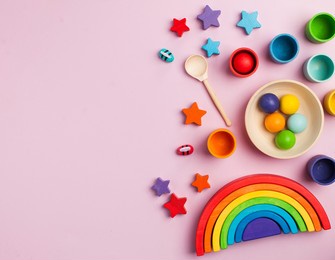 eco-friendly colored wooden educational toys based on the montessori method. wooden rainbow, sorted by color. copy space