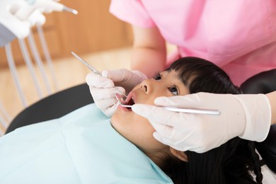 a girl undergoing dental examination