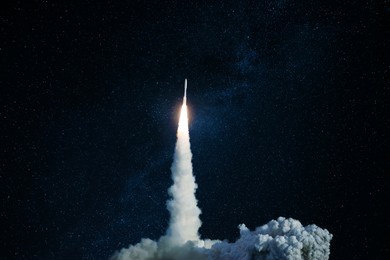 successful launch of a space rocket into outer space. spaceship lift off into the starry sky. travel and exploration other planets, concept