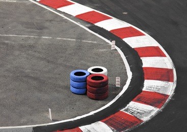 tires on a racing track with american colors