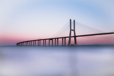 vasco da gama bridge at sunset. lisbon bridge at sunset