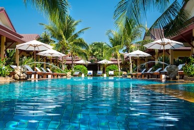 beautiful swimming pool in tropical resort , phuket, thailand. 