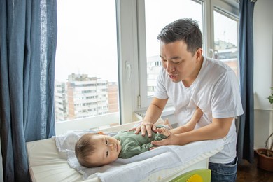 father playing with baby boy, japanese family