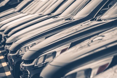 cars for sale stock lot row. car dealer inventory