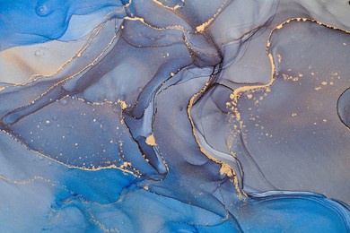 currents of translucent hues, snaking metallic swirls, and foamy sprays of color shape the landscape of these free-flowing textures. natural luxury abstract fluid art painting in alcohol ink technique