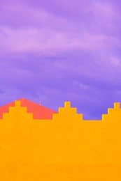 fashion tropical minimal location. yellow building and blue summer sky. canary islands. travel aesthetics wallpaper