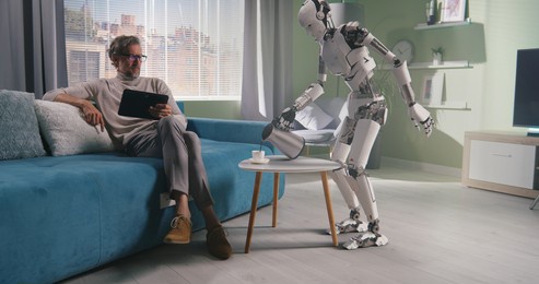 robot preparing coffee for owner