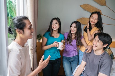 asian young friend having fun together in the bedroom