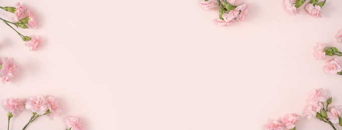 design concept of mother's day holiday greeting design with carnation bouquet on pastel pink table background