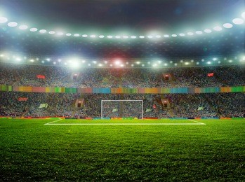 soccer ball on the field of stadium with light 