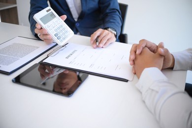 business people signing contract making a deal with real estate agent concept for consultant and home insurance. 
real estate investment property insurance and security. real estate agent offer 