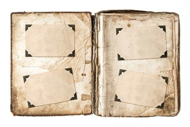 old photo album page with frames and corners isolated on white background