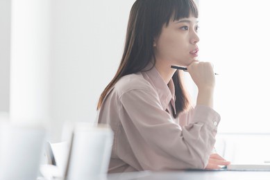 female college student taking class