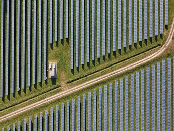 drone aerial view power station producing clean, sustainable solar energy  in italy
