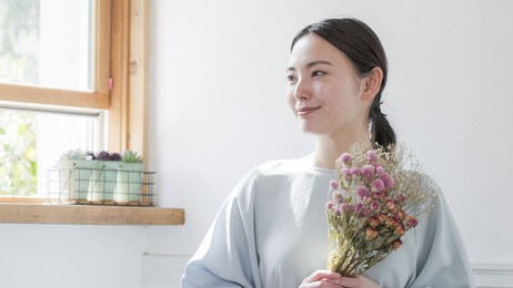 young woman with a bouquet
