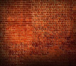 abstract weathered texture of stained old dark stucco brown and painted red, yellow brick wall background in rural room grungy rusty blocks of stonework tech darken retro color architecture wallpaper