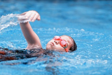 children girl in swimming pool