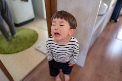 a little boy who hates and cries