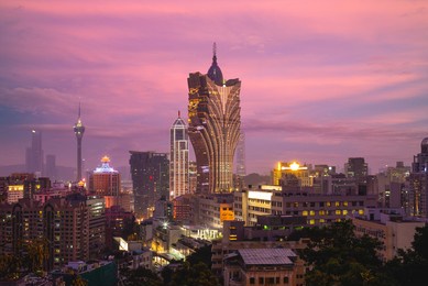 hotel and casino of macau cityscape skyline in china at night.