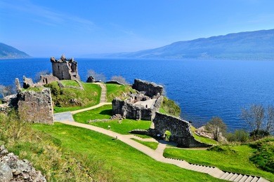 ruins of urquhart castle along loch ness, scotland