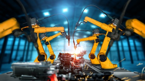 mechanized industry robot arm for assembly in factory production line . concept of artificial intelligence for industrial revolution and automation manufacturing process .