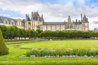 beautiful park with and ancient fontainebleau palace. palace of fontainebleau - one of largest medieval royal chateaux in france (55 km from paris), unesco world heritage site.