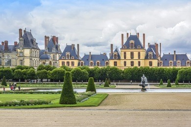beautiful park with and ancient fontainebleau palace. palace of fontainebleau - one of largest medieval royal chateaux in france (55 km from paris), unesco world heritage site.