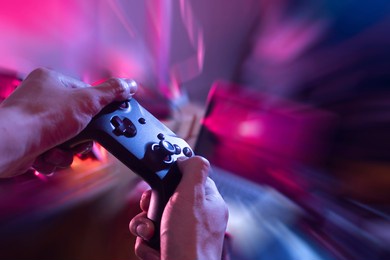 gamer playing game by joystick with computer, gaming and esports challenge, streaming online, tournament concept