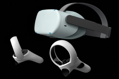 virtual reality glasses and controllers for online and cloud gaming on black background. 3d rendering of device for virtual design in augmented reality or virtual gaming in vr
