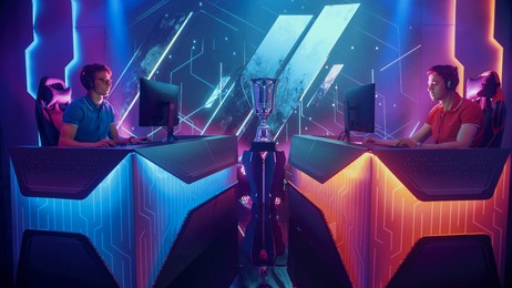 two professional esport gamers actively compete in video game playing on championship event with big tv screens. global online streaming cyber gaming tournament. speedrun duel.