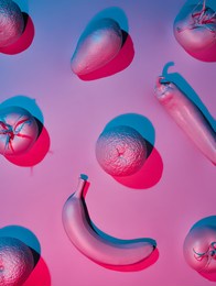 pattern with holographic neon colored vegetable and fruits. creative food concept. surreal trendy layout with fluorescent colors. flat lay, top view. 
