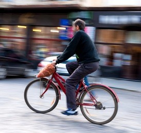 cyclist on the city roadway in motion blur