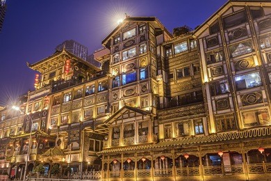 chongqing, china at hongyadong hillside buildings.