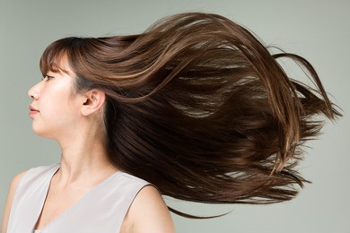 women's hair is vibrant and shining.