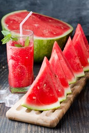 fresh watermelon juice with ice in a glass. slices of watermelon on the table.fresh watermelon juice with ice in a glass. slices of watermelon on the table.
