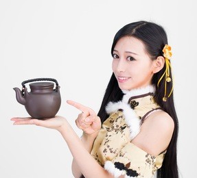 asian girl woman model holding a teapot