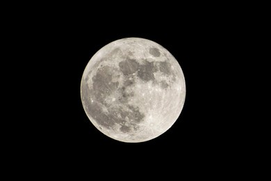 super full moon with dark background. madrid, spain, europe. horizontal photography.
