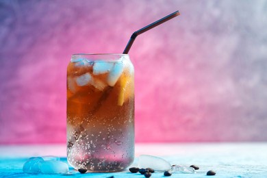 trendy summer refreshing drink espresso tonic on a colored backlit background